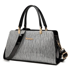 Sophisticated Bag - Stylish Striped Handbag with Metallic Accents