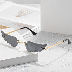 Unique Rimless Geometric Sunglasses with Wing Accents