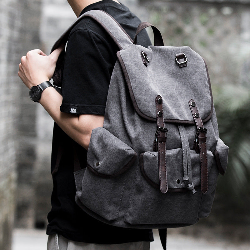 Rugged and Stylish Canvas Backpack with Leather Accents