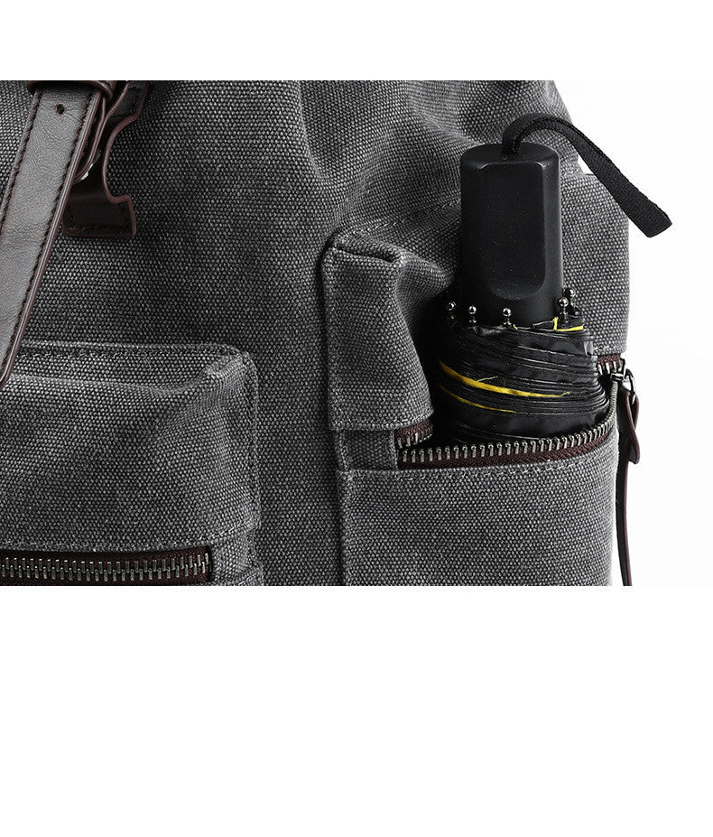 Rugged and Stylish Canvas Backpack with Leather Accents