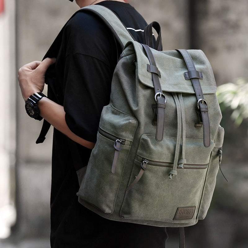 Rugged and Stylish Canvas Backpack with Leather Accents