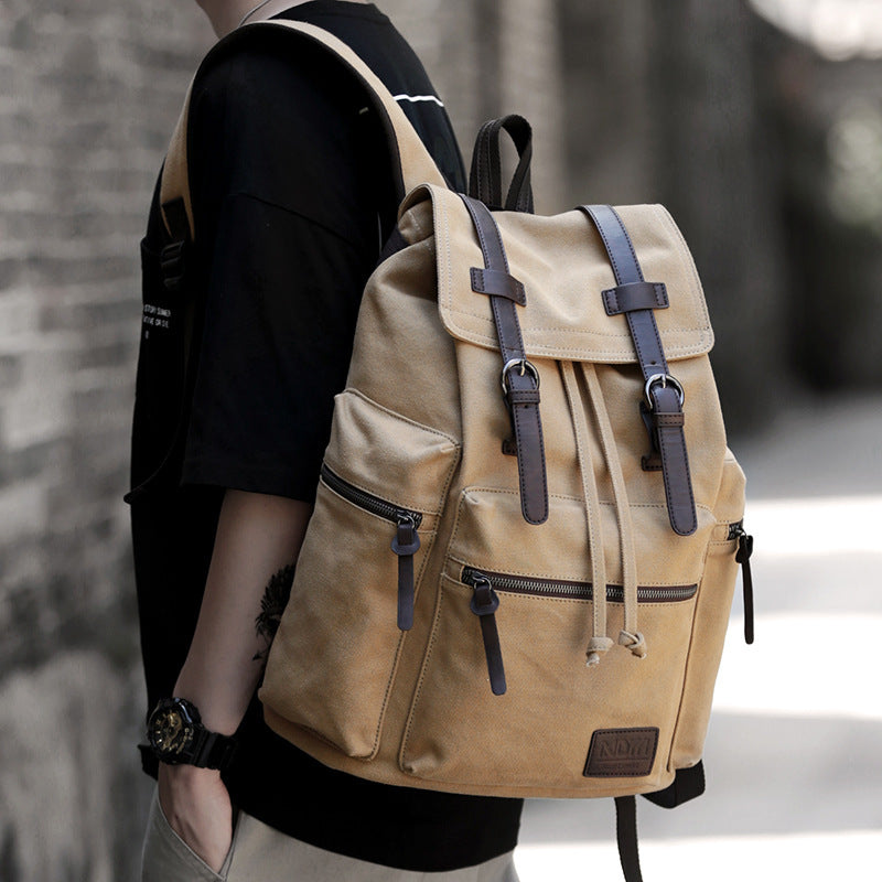 Rugged and Stylish Canvas Backpack with Leather Accents