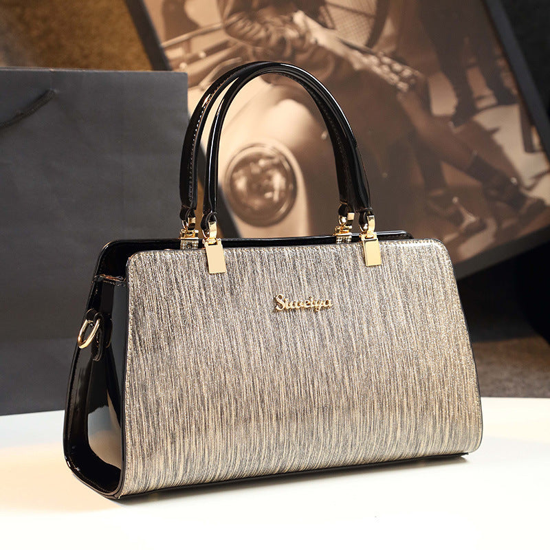 Sophisticated Bag - Stylish Striped Handbag with Metallic Accents