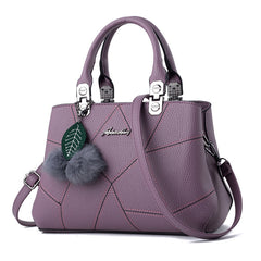 Stylish and Chic Women's Handbag with Fur Charm Accent