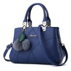 Stylish and Chic Women's Handbag with Fur Charm Accent