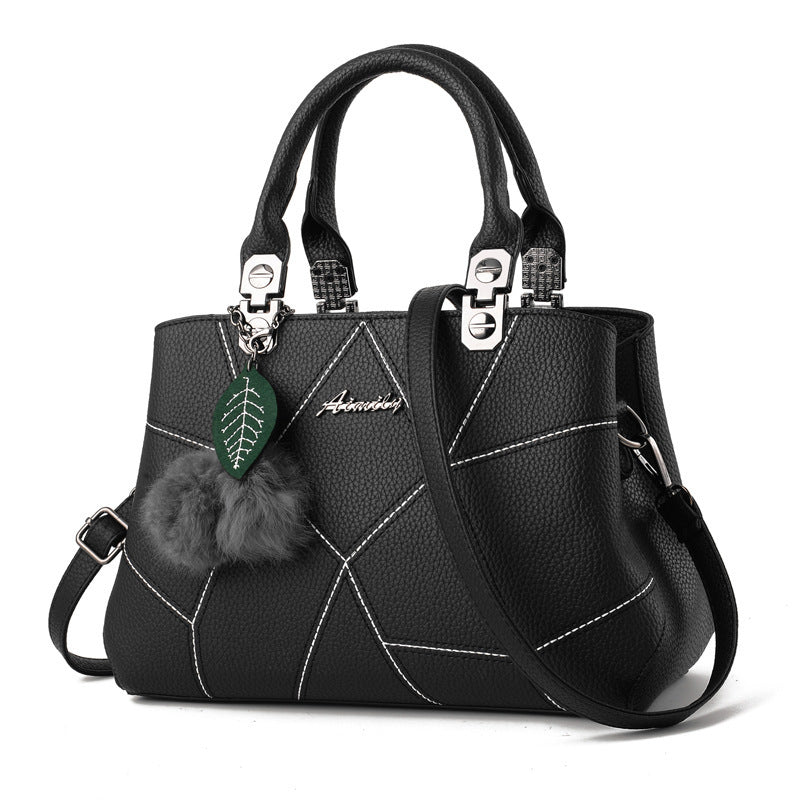 Stylish and Chic Women's Handbag with Fur Charm Accent