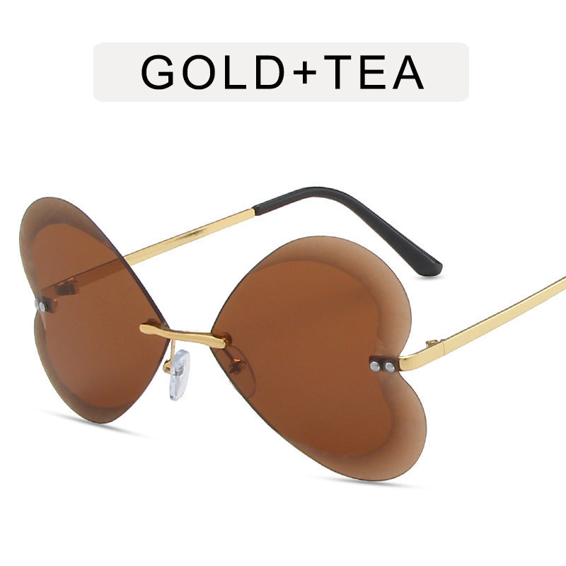 Stylish Rimless Round Sunglasses with Metal Accents