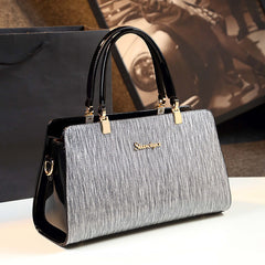 Sophisticated Bag - Stylish Striped Handbag with Metallic Accents