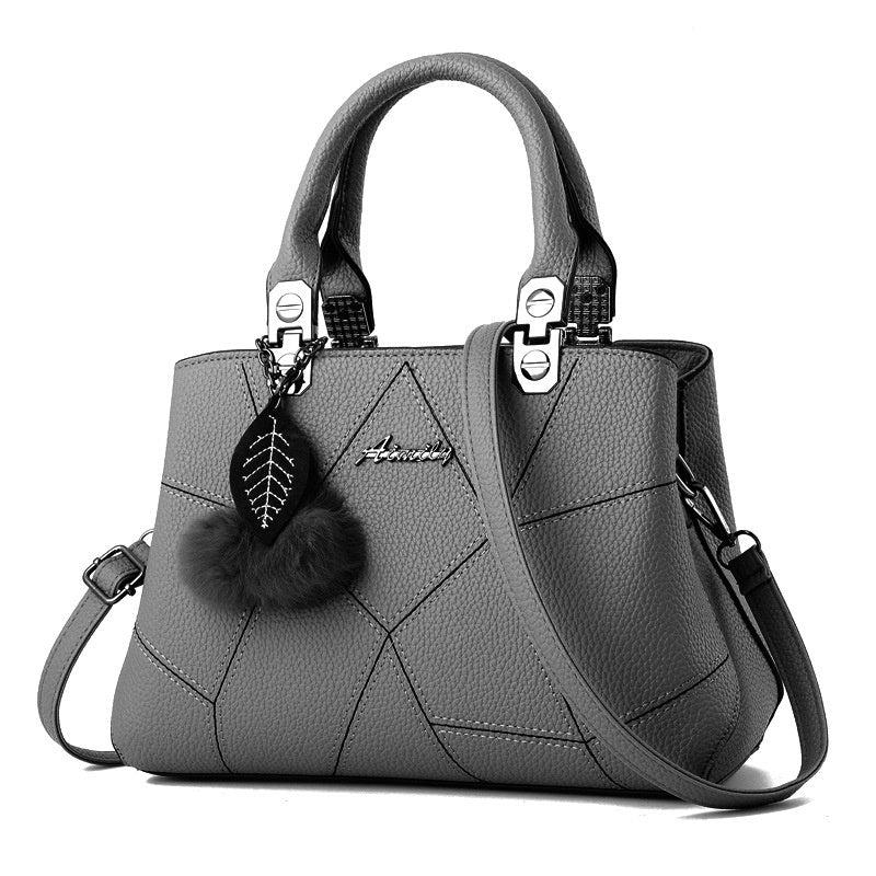 Stylish and Chic Women's Handbag with Fur Charm Accent